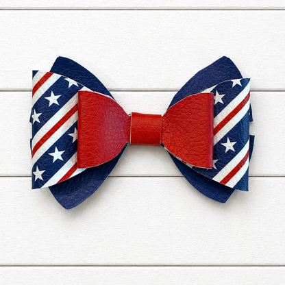 Bow tie with American flag design on a white wooden background