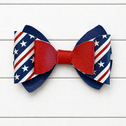 Bow tie with American flag design on a white wooden background