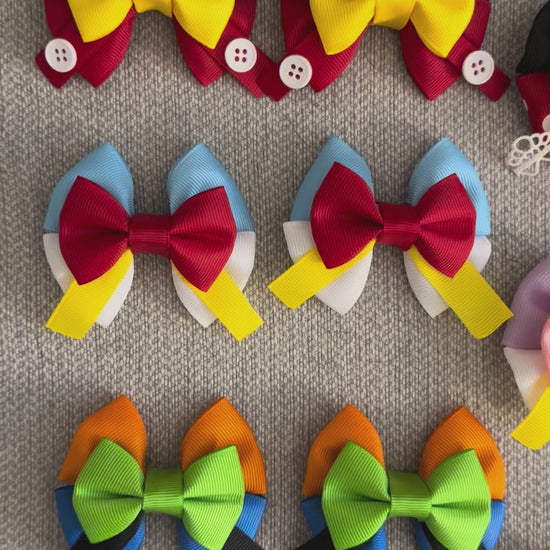 Video showing all Mouse Clubhouse Pigtails on a grey background