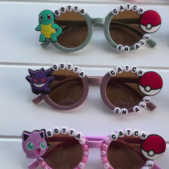 Video of all adventure trainer glasses on white paneled background