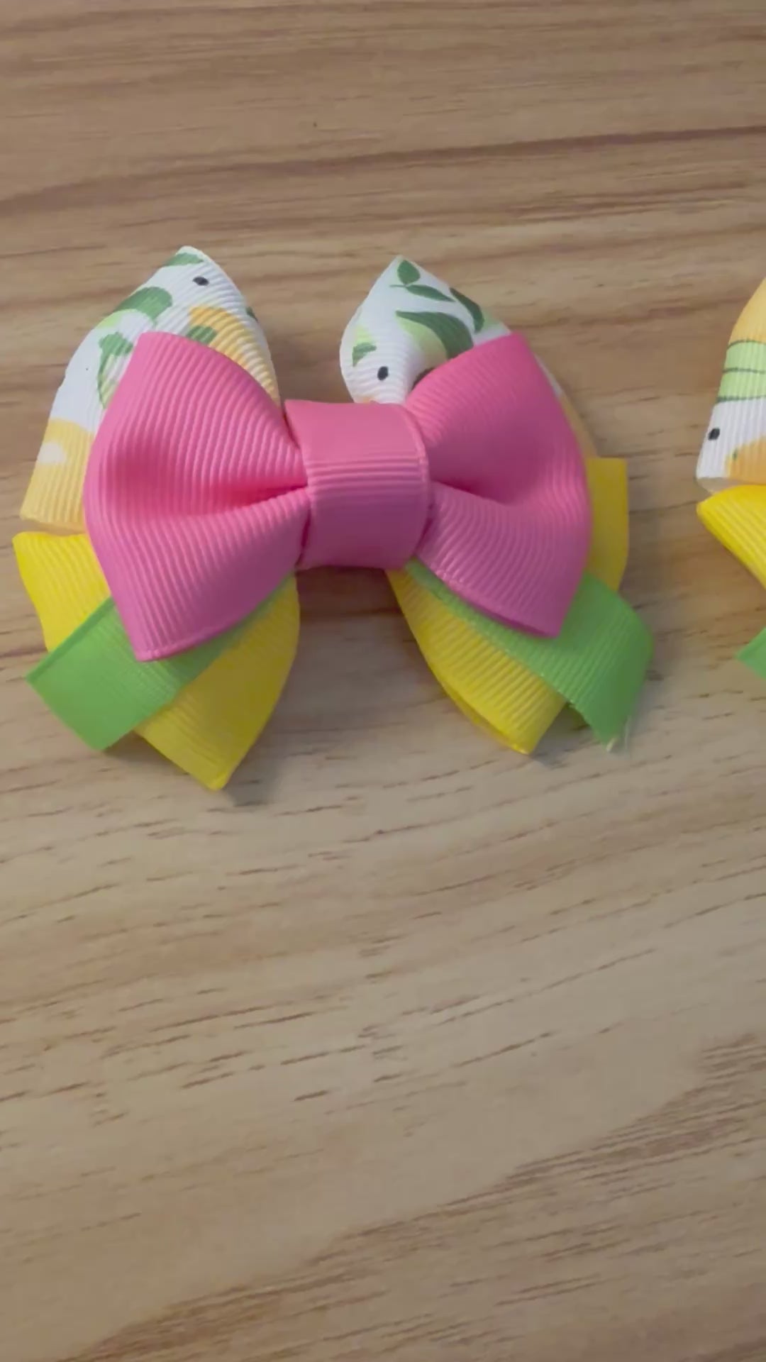 Video of pink lemonade pigtails on a wood background