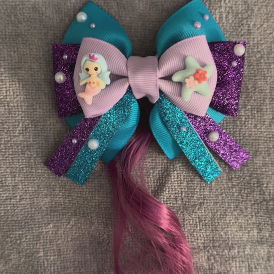 Video of mermaid bow with hair extension