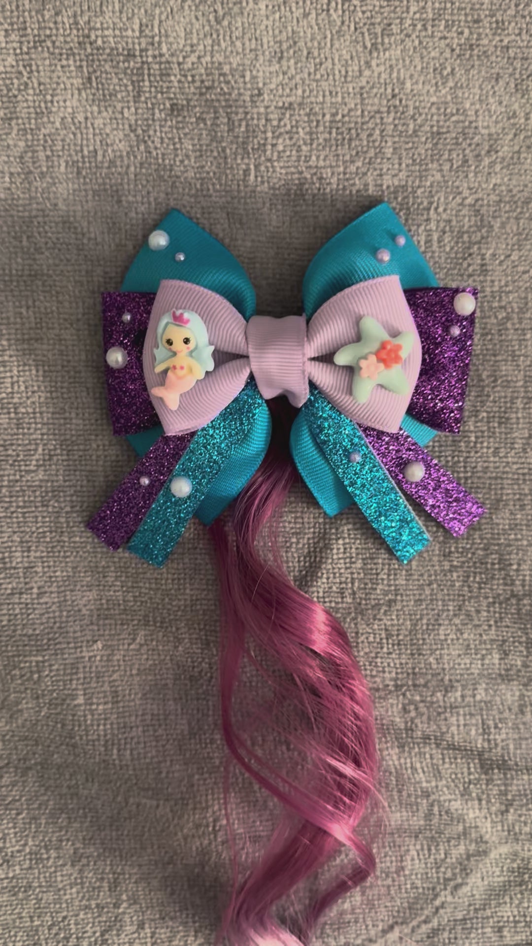 Video of mermaid bow with hair extension