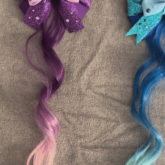 Video showing all 3 bloom crew bows with hair extensions on grey background