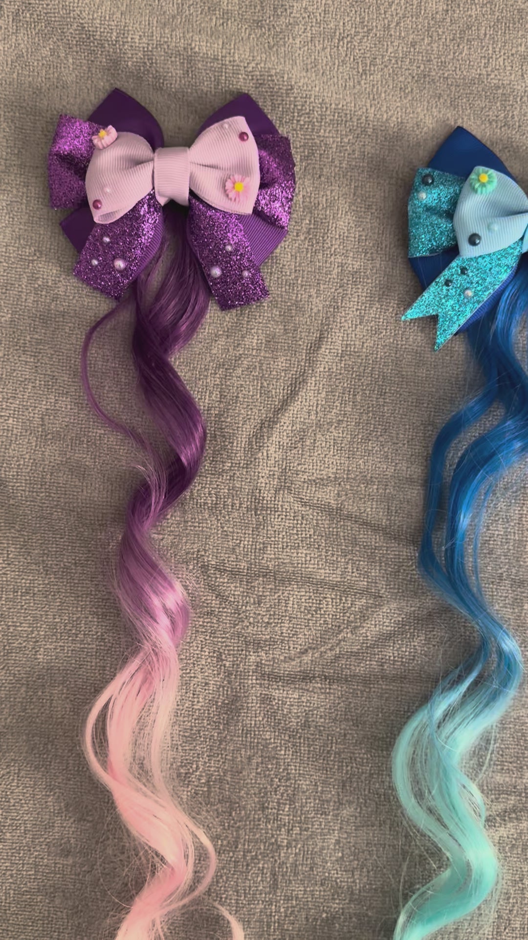 Video showing all 3 bloom crew bows with hair extensions on grey background